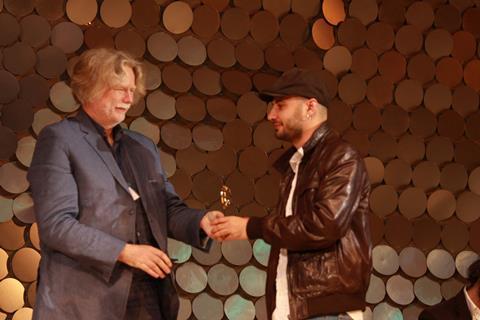 International Jury president Fridrik Thor Fridriksson presents Grand Prix to Dragomir Sholev for his debut Shelter